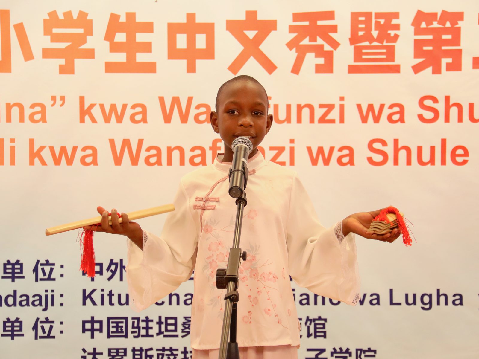 A pupil performing at the Chinese Show for school students